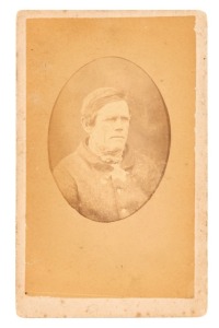 TASMANIAN CONVICT PHOTOGRAPH: A carte-de-visite, annotated verso: "108. Thomas Wilson alias Murphy. per "Dd Clark". Taken at Port Arthur 1874." Thomas WILSON was convicted at Carnarvonshire on 1 Aug 1840 for breaking into a dwelling and stealing. Gaol Report: "vicious, desperate disposition, conduct disorderly & bad connections". 15 year transportation sentence. Sent to Van Diemen's Land per the ship "David Clarke" on it's only voyage carrying convicts, arriving 4 Oct 1841. He was still in gaol