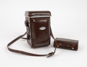 YASHICA: Yashica 635 TLR camera [#ST3120154], c. 1958, with Yashikor 80mm f3.5 lens, lens cap, leather case, and 35mm conversion kit. (2 items) - 2