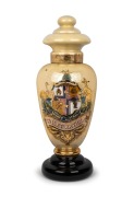 An antique glass Apothecary jar emblazoned with the Australian coat of arms and "Advance Australia, Toilet Articles", 19th century, 65cm high