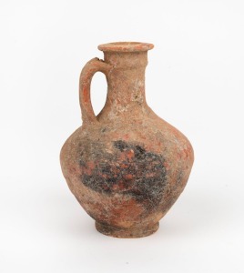 A Roman terracotta jug, 1st-2nd century, A.D., 13cm high
