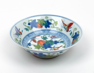 An antique Chinese porcelain bowl with enamel decoration, Qing Dynasty 18th/19th century, six character blue mark to base, ​​​​​​​4cm high, 13cm diameter
