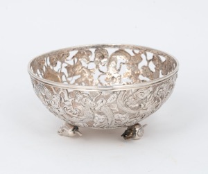 A Chinese export silver pierced bowl with dragon decoration and fruit feet, 19th/20th century, 6cm high, 116 grams