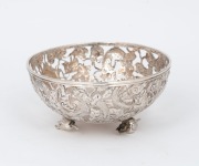 A Chinese export silver pierced bowl with dragon decoration and fruit feet, 19th/20th century, 6cm high, 116 grams