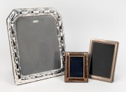 Two sterling silver picture frames, together with a silver plated picture frame, (3 items), ​​​​​​​the largest (silver plated example) 31cm high