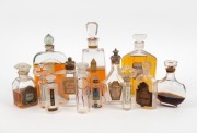 Thirteen assorted French glass perfume bottles including DRYADE, MUGUET, GUERLAIN JICKY, and others, ​​​​​​​the largest 18.5cm high