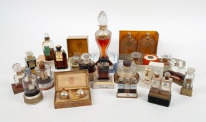 Twenty assorted perfumes with original card display bases or boxes, ​​​​​​​the largest 18cm high