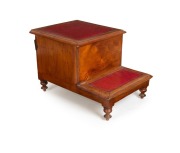 An antique Colonial Australian huon pine bed step commode with embossed and tooled red leather tops and original porcelain liner, Tasmanian origin, circa 1855, 46cm high, 49cm wide, 68cm deep