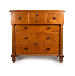 An antique Australian huon pine cantilever chest of seven drawers with full turned columns and blackwood knobs, full huon pine secondary construction, Tasmanian origin, circa 1845, 126cm high, 127cm wide, 53cm deep