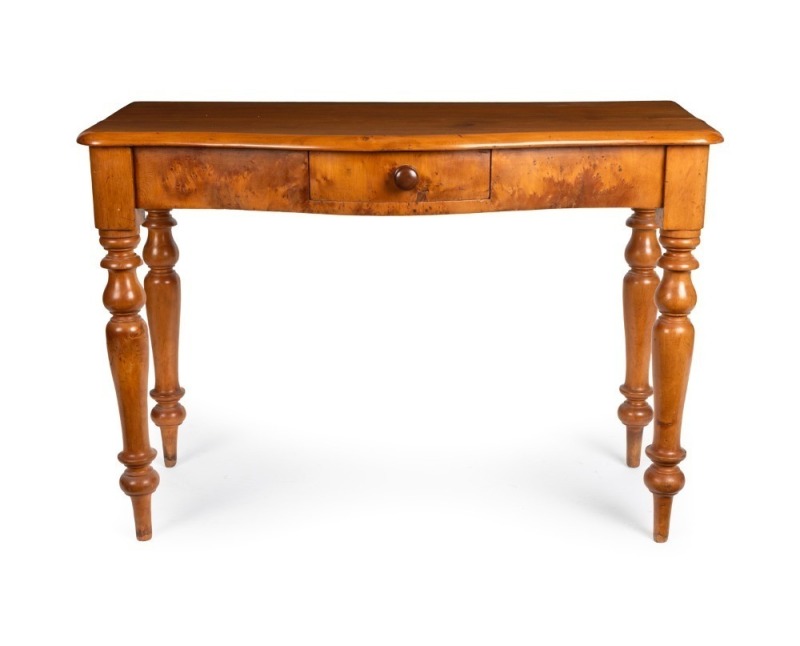 An antique Australian huon pine hall table with serpentine front, turned legs and single drawer, Tasmanian origin, circa 1870, 75cm high, 106cm wide, 50cm deep