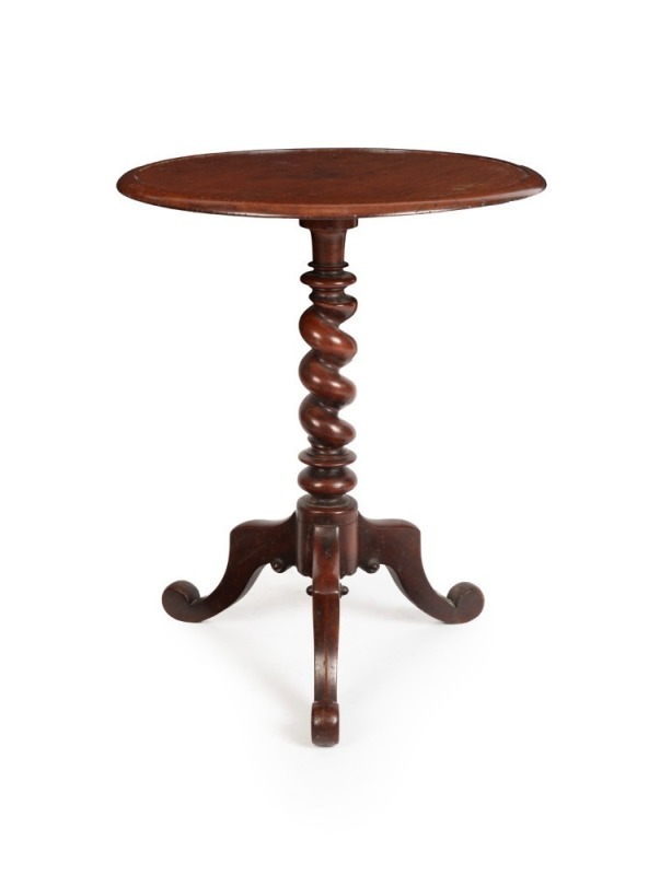 An antique Australian cedar wine table with barley twist column and carved scrolling tri-form base, Tasmanian origin, 19th century, 69cm high, 55cm diameter