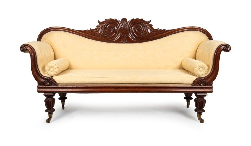 A Colonial Australian cedar double ended settee with Thomas Hope scroll back and yellow jacquard upholstery, Tasmanian origin, circa 1840, 115cm high, 220cm wide, 61cm deep