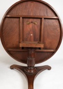 An early colonial cedar tilt-top breakfast table with handsomely selected solid book-matched top, cross-banded edge and frieze, turned and carved centurion&nbsp;skirt column, and finely crafted triform base with original concealed castors, full cedar secondary - 4