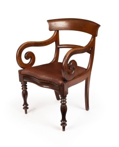 An antique Colonial Australian cedar carver chair with Trafalgar back, scroll supports, serpentine front rail and faceted legs, circa 1850, ex Clifford Craig collection, 90cm high, 54cm across the arms