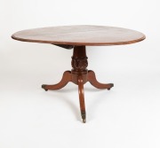 A Colonial Australian cedar tilt-top circular supper table with acanthus carved column, outward swept legs, and square form brass capped castors, two plank top with thumbnail edge, Tasmanian origin, circa 1830s. Note: Originally a fixed top table which ha - 2