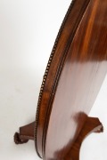 An important early Tasmanian Colonial cedar centre table with fluted and carved central column on quadraform base, circa 1830. Featuring knulled decorations, this table relates to a very similar example held at Government House in Hobart. Attributed to WI - 3