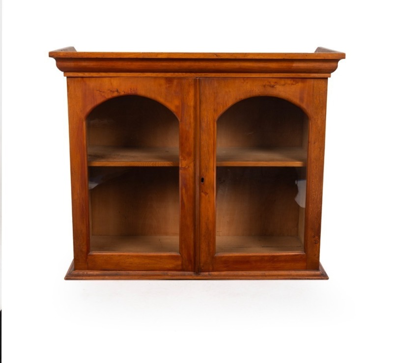 An antique Australian huon pine two door bookcase cabinet, Tasmanian origin, 19th century, 68cm high, 82cm wide, 31cm deep