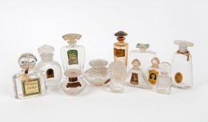 Twelve assorted French glass perfume bottles, some with original labels, the largest 11.5cm high
