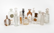 Thirteen assorted French glass perfume bottles including gilt finish and silver overlay examples, ​​​​​​​the largest 15cm high