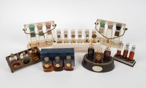 Seven assorted vintage perfume shop display bottle stands and boxed perfumes, including CORDON and COTY, the largest 22cxm wide