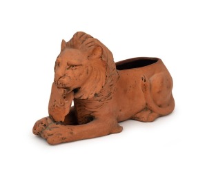 WWI period British Patriotic pottery lion with peace shield, sold to raise funds for the war effort, manufactured by Bretby Pottery, 15cm high, 25cm long