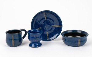 REYNELLA POTTERY blue glazed cup and saucer; together with a bowl and egg cup, (4 items), all incised "Reynella Pottery, S. Aus.", dated 1921 and 1922, the saucer 11cm diameter