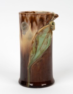 REMUED brown and green glazed pottery vase with applied gumnuts and leaf, incised "Remued, 145/6M" with original foil label, 15cm high