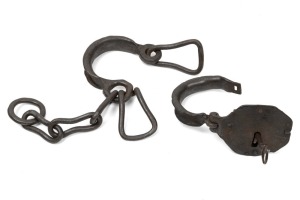 Convict leg irons with key, 19th century, 47cm wide