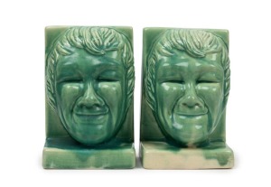 MELROSE WARE pair of green glazed pottery "Comedy" bookends, 16.5cm high