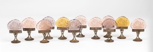 MOSER (attributed) antique Austro-Hungarian set of twelve place name holders with intaglio cut glass decoration and gilt metal mounts, 19th/20th century, 6cm high