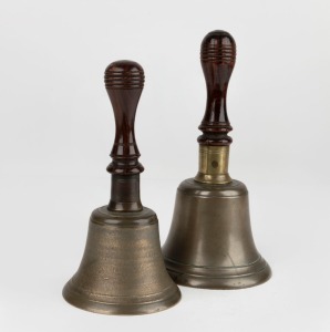 Two antique bells with turned blackwood handles, 19th century, 22.5cm and 25.5cm high