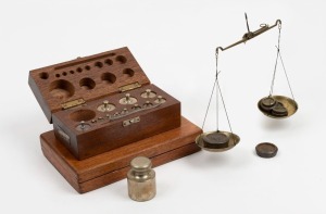 Apothecary weight set in timber case; together with handheld gold scales and assorted weights, 19th and 20th century, (2 items). the apothecary set 18cm wide