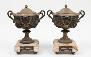 A pair of antique French gilt metal mantle garnitures on marble bases, 19th century, 30cm high