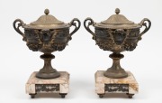 A pair of antique French gilt metal mantle garnitures&nbsp;on marble bases, 19th century, 30cm high