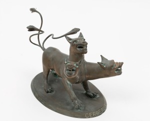 CERBERUS cast bronze three headed creature, engraved with title, 19th/20th century, 20cm high, 32cm long