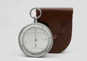 A vintage American pocket barometer altimeter by Taylor, housed in original leather pouch, 20th century, 11cm high including bow