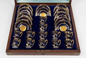 LIMOGES fine quality 24 piece antique French porcelain blue and gilt coffee set, housed in a plush fitted oak case, 19th century, the case 46cm wide