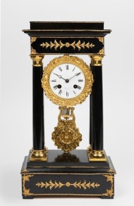 An antique French portico clock in ebonized case with gilt metal mounts, eight-day time and strike movement with Roman numerals, 19th century. 42cm high.