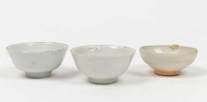 Three antique Chinese white porcelain dishes, Sung Dynasty and later, the largest 3.5cm high, 8cm diameter