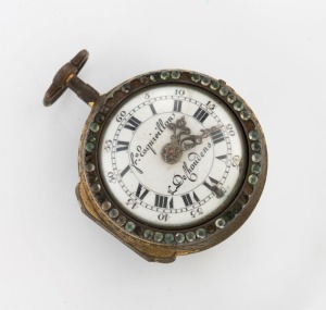 An antique French pair cased lady's pocket watch with gilt metal finish, rhinestone bezel and pictorial enamel back, 19th century, 5.5cm high including bow