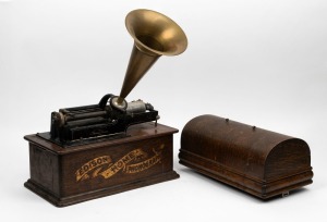 EDISON HOME PHONOGRAPH in oak case with small brass horn, early 20th century, the case 41cm wide