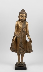 A vintage standing Thai Buddha statue, carved wood and glass with gilt finish, 20th century, 80cm high