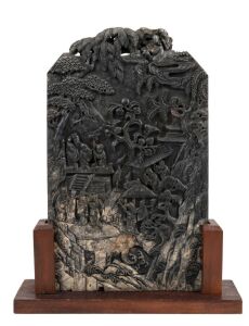 A Chinese carved hardstone tablet plaque on later wooden stand, Qing Dynasty, 19th/20th century, 31cm high not including stand
