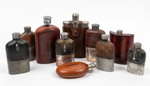WHISKEY FLASKS group of ten leather mounted examples with silver plate and pewter fittings, mostly 20th century, the largest 18cm high