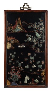 A vintage Chinese black lacquered panel inlaid with semi-precious stones, 20th century, 95 x 54cm overall