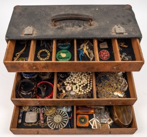 A four drawer jewellery chest with assorted costume jewellery including many French examples.