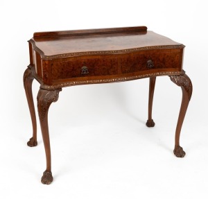A good quality vintage George II revival walnut dressing table with serpentine front edge on cabriole legs with well carved acanthus knee terminating on hairy paw feet, 20th century, 81cm high, 97cm wide, 52cm deep