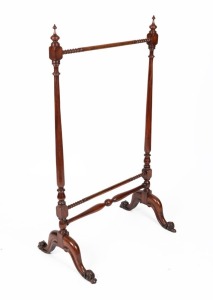 A mahogany towel rail on turned supports and carved cabriole legs, mid 19th century, 130cm high, 74cm wide, 50cm deep