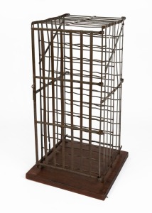 A vintage iron wine cage on jarrah base, 20th century, 130cm high, 56cm wide, 54cm deep