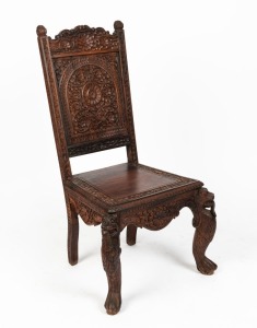 A vintage Indian carved rosewood side chair adorned with floral motif and zoomorphic front legs, 20th century, 106cm high