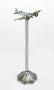 Trench Art: Bristol Beaufighter on stand, c. 1940s, solid chrome-plated brass, 39cm high and 18cm wingtip to wingtip.